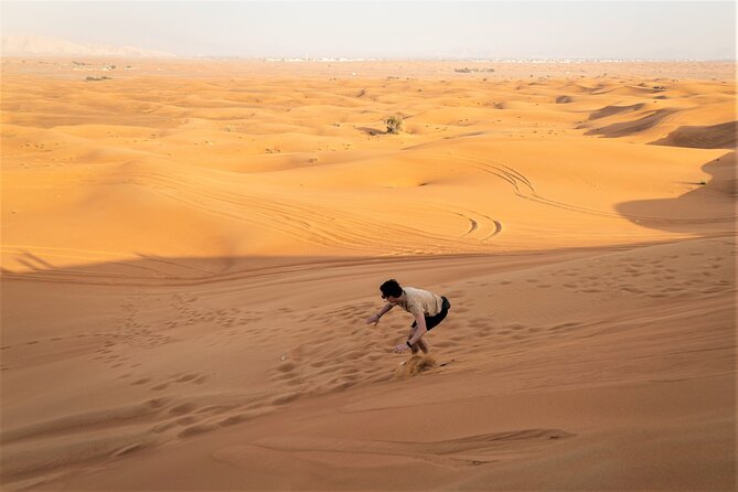 Dubai Red Dunes with Sandboarding, Camel Ride, Falcon & VIP Camp - The Bedouin-style camp after dark