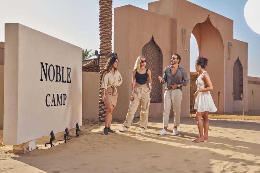 Dubai’s Best Desert Safari: Live Show & Gourmet BBQ Dinner - Baby camels, adult camels, and a taste of desert life