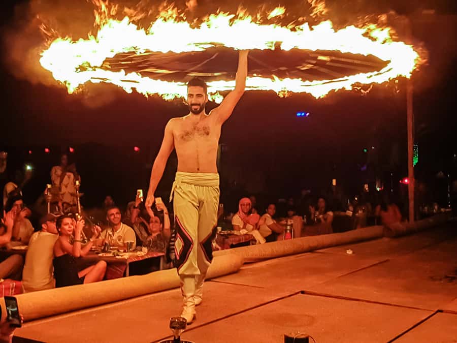 Dubai: Safari, Quad Bike, Camel Ride, and Buffet Dinner - BBQ dinner and shows under the night sky