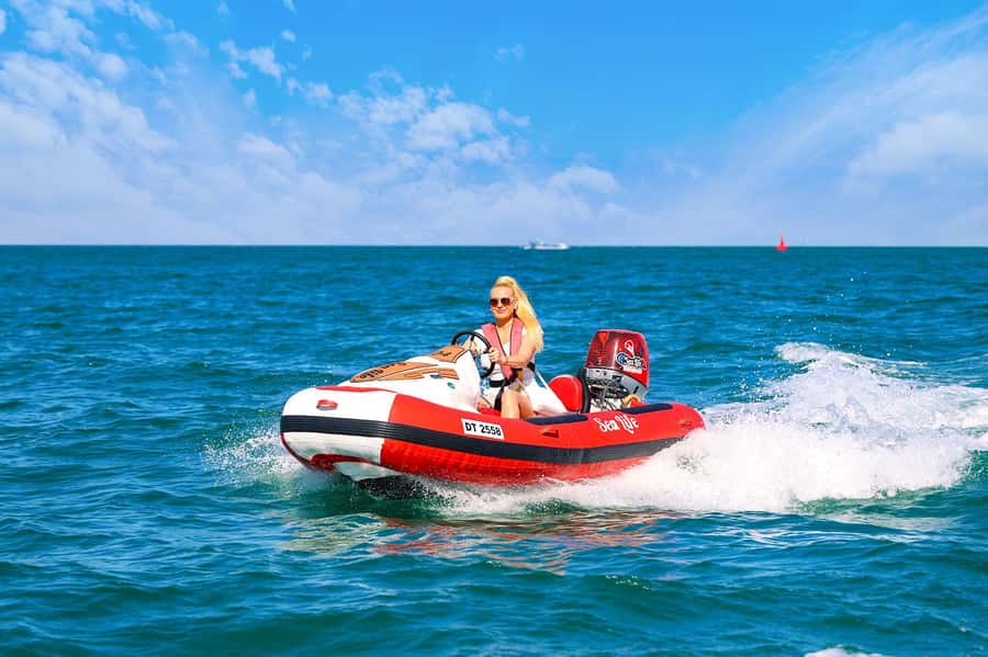 Dubai: Self-Drive Boat Experience for 1 or 2 People - Driving a speedboat beside Dubai’s skyline