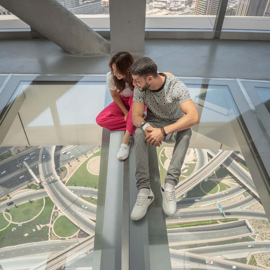 Dubai: Sky Views Observatory Ticket with Optional Extras - Taking the transparent Glass Slide