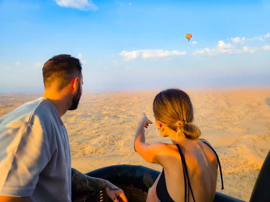 Dubai: Sunrise Hot Air Balloon Ride with Transfers - The landing, certificate, and ride back