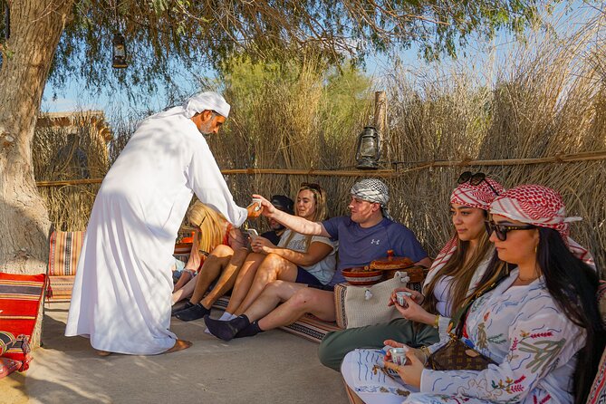 Dubai: Sunset Camel Trek, Al Khayma Camp, Stargazing & BBQ - Live shows keep the camp moving after dark