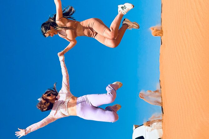 Dubai Sunset Red Dune Desert Safari, Sandboarding and Camel Ride - Dinner and camp shows depend on the option