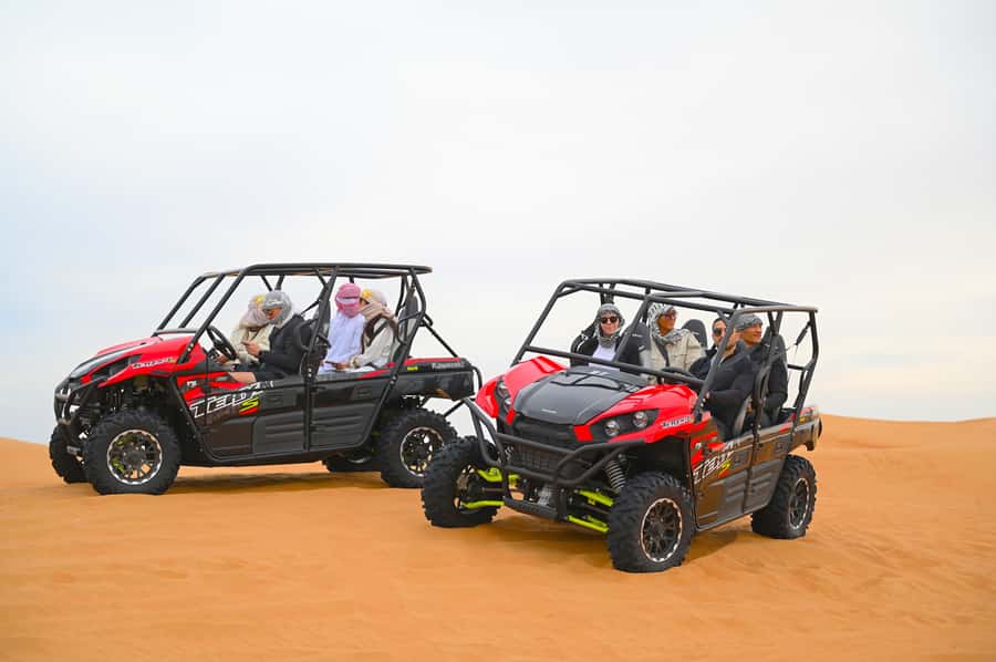 Dubai: Tour with BBQ Dinner, Camel Ride, & Traditional Show - Henna, coffee, and a familiar desert-camp program