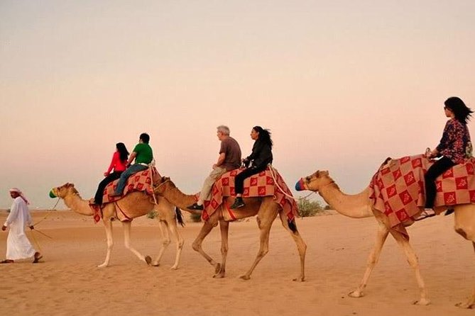 Evening Desert Adventure: Quad Biking, Sandboarding & Camel Ride - Quad biking across the Lahbab dunes