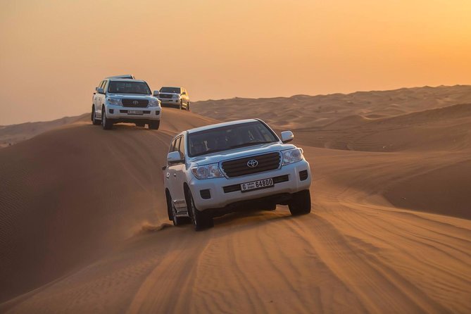 Evening Desert Adventure: Quad Biking, Sandboarding & Camel Ride - Arabic coffee, henna, and the Al Awir camp