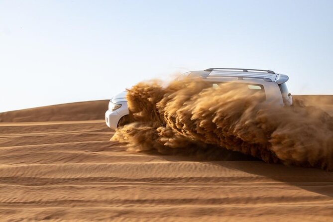 Evening Desert Safari & BBQ With Live Shows,Camel Ride,Falcon pic - Entering the camp at Al Awir