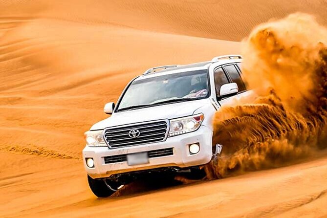 Evening Desert Safari Dubai with Camel Riding & BBQ Buffet Dinner - Sunset views, sandboarding, and a very short camel ride
