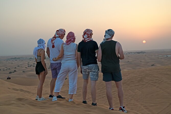 Evening Desert Safari in Dubai, Sandboard & BBQ Dinner - What the guide can add to the day