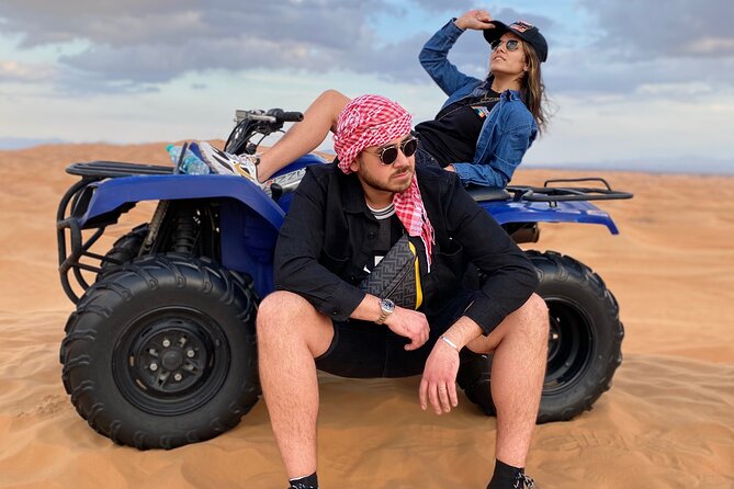 Evening Quad Bike, Desert Safari in Dubai , BBQ Dinner and Shows - Sand boarding and the sunset photo stop
