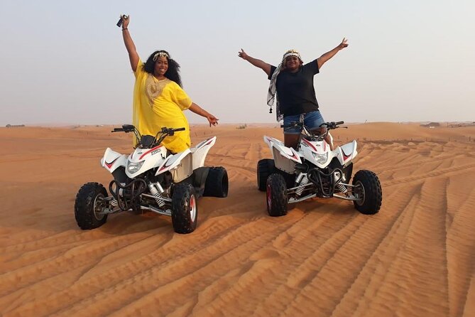 Evening Red Dunes Safari with Quad Biking, BBQ Dinner & LiveShows - First stop at Lahbab: camel riding and red sand