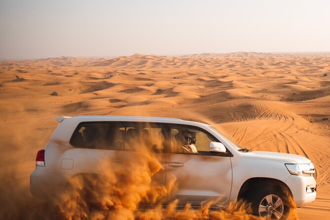 Full Day Safari Grand Adventures with Dune Bash on 4X4 in Dubai - Camel riding and sandboarding at the camp