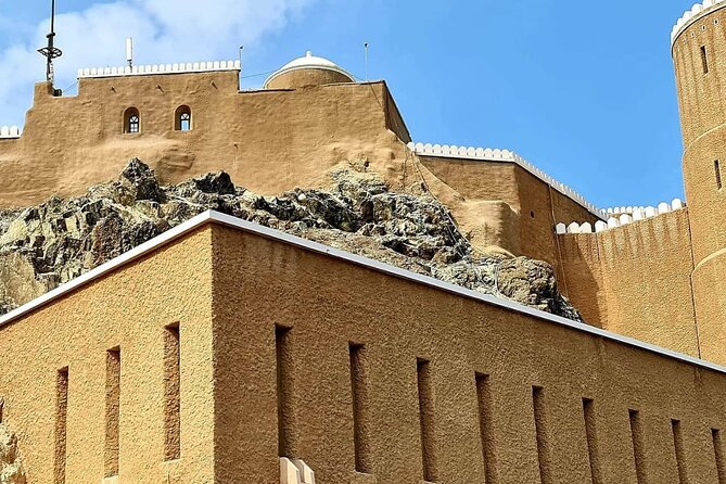 Half-Day Private Muscat City Tour - Top Landmarks in Just 4 Hours - Qurum Beach, bread with honey, and karak tea