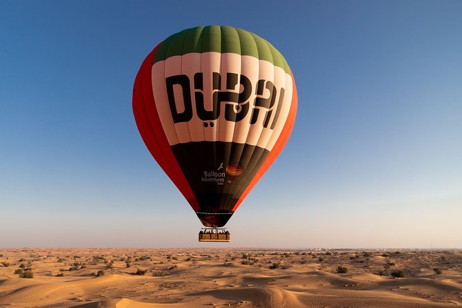 Luxury Hot Air Balloon, Land Rover Defender & Michelin Breakfast - Sunrise, falcons, and the desert below