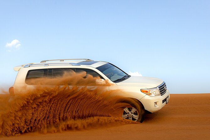 Morning Desert Safari, Quad Bike, Sandboard and Camel Ride - Dune bashing across Lahbab