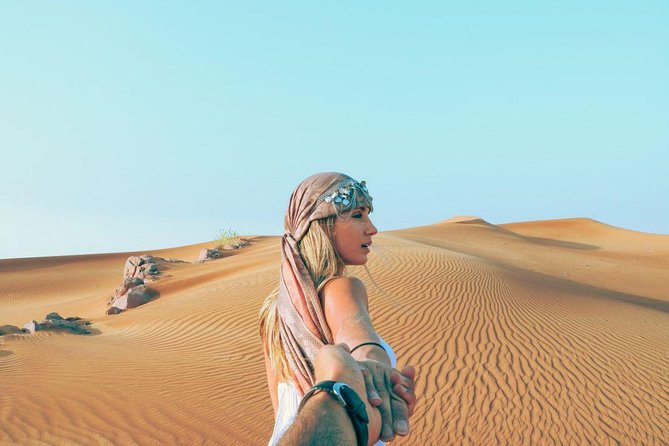 Morning Red Dunes Safari: Camel Ride & Sandboarding Adventure - Photo Stops, Water, and Desert Views