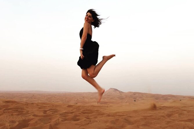 Morning Red Dunes Safari: Camel Ride & Sandboarding Adventure - The Camel Ride: Traditional Touch, Tourist-Style Experience