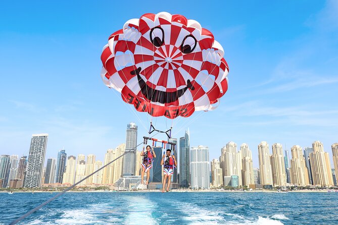 Parasailing in Dubai with Palm Jumeirah and JBR Beach views - The views: Palm Jumeirah, JBR, and Dubai’s skyline