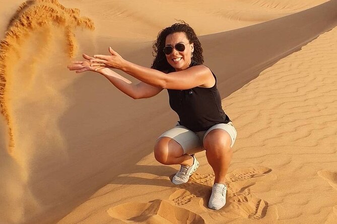 Premium Desert Safari Dubai : Dune Bashing, Camel Ride with BBQ - Sandboarding and sunset photos at Lahbab