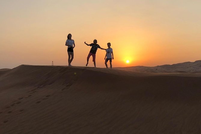 Private Morning Desert Safari Dubai with Dune Bashing & Sandboard - Sandboarding on the Lahbab dunes