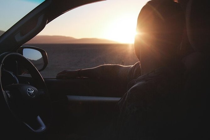Qatar Sunset Desert Safari: Dune Bashing & Golden Sands Adventure - Sandboarding on soft, shifting ground