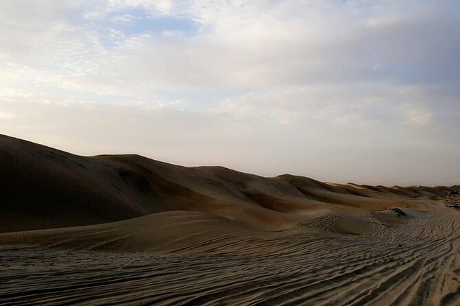 Qatar Sunset Desert Safari: Dune Bashing & Golden Sands Adventure - Safety, age limits, and practical comfort