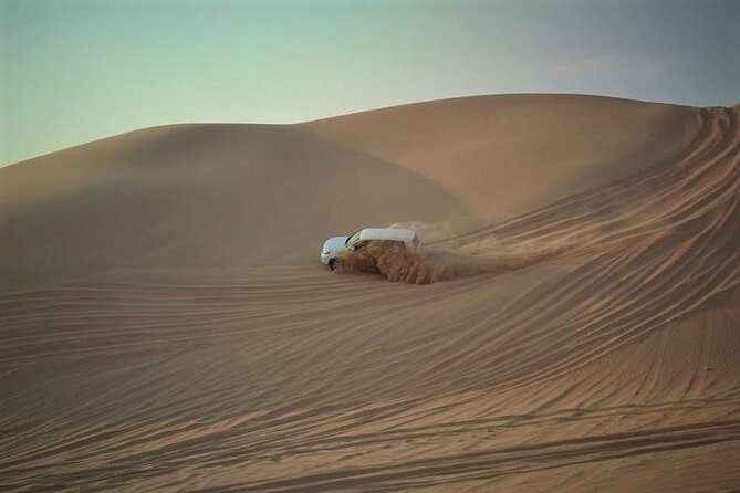 Qatar Sunset Desert Safari: Dune Bashing & Golden Sands Adventure - Two hours across Qatar’s golden dunes