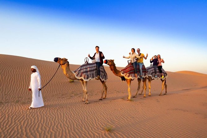 Red Dunes Desert Safari with 4x4 Pick up & Drop, Camel ride, BBQ and Live shows - Sunset photography in the red sand