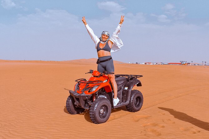 Sunset Desert Safari Quad bike Camel ride Sand Board & BBQ Dinner - Al Lahbab: quad bikes, red dunes, and sunset photographs