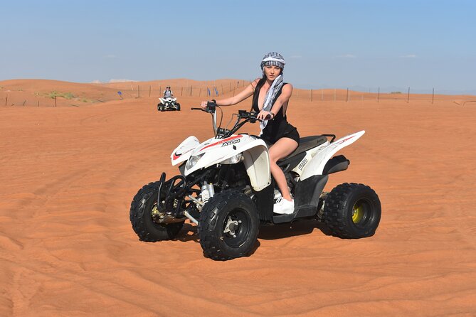 Sunset Desert Safari Quad bike Camel ride Sand Board & BBQ Dinner - The Al Awir camp after sunset