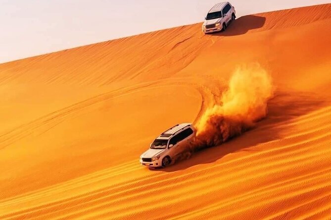 Sunset Evening Safari,Camel ride,live shows and BBQ Dinner with No Hidden Charge - Lahbab’s red dunes set the tone