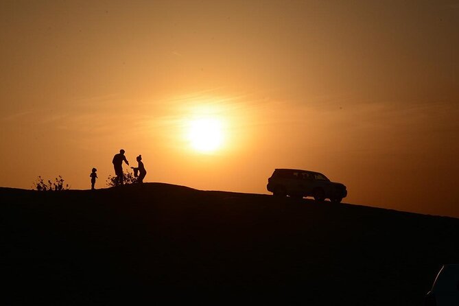 Sunset Evening Safari,Camel ride,live shows and BBQ Dinner with No Hidden Charge - Camel riding and the camp arrival